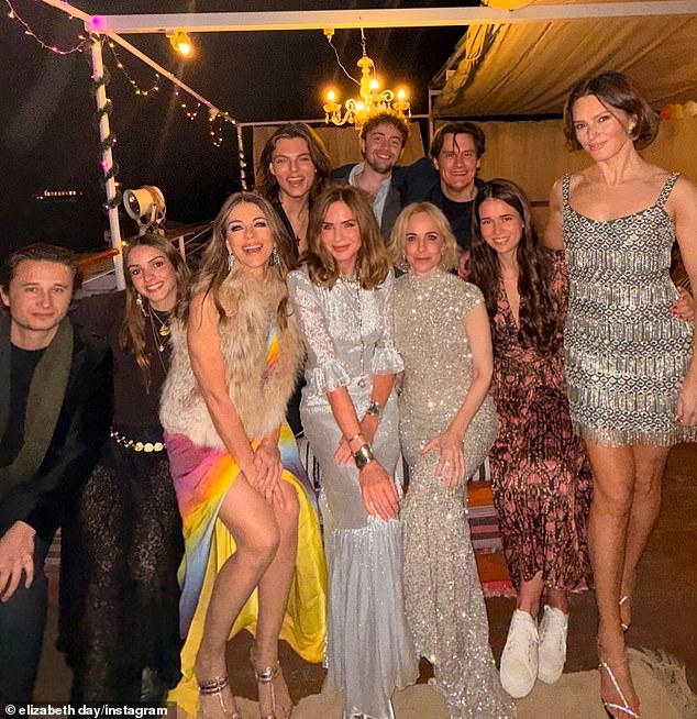 Meanwhile Elizabeth Hurley and son Damian partied on a yacht with Trinny Woodall and Elizabeth Day