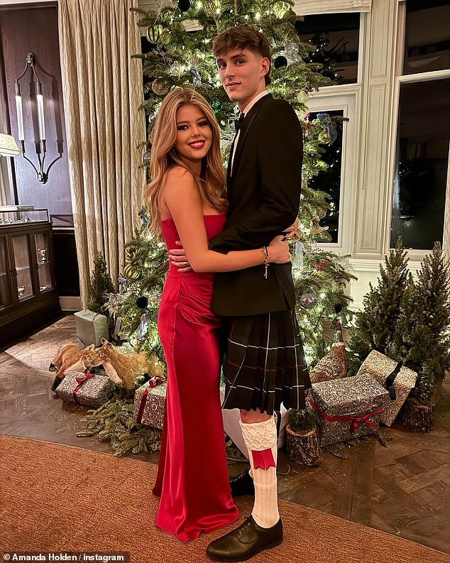 The couple's oldest daughter Lexi wowed in a glamorous red satin strappy gown as she posed with her boyfriend who was dressed in a kilt