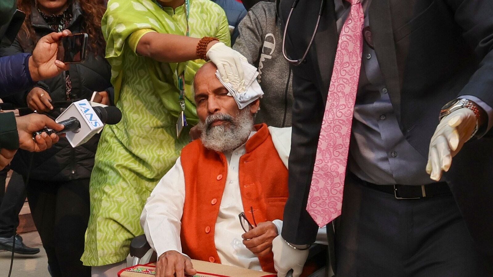 BJP MP Pratap Chandra Sarangi on a wheelchair being taken to a hospital after he got injured in clashes between INDIA Bloc and NDA MPs during a protest, at Parliament complex, in New Delhi, Thursday, Dec. 19, 2024. 