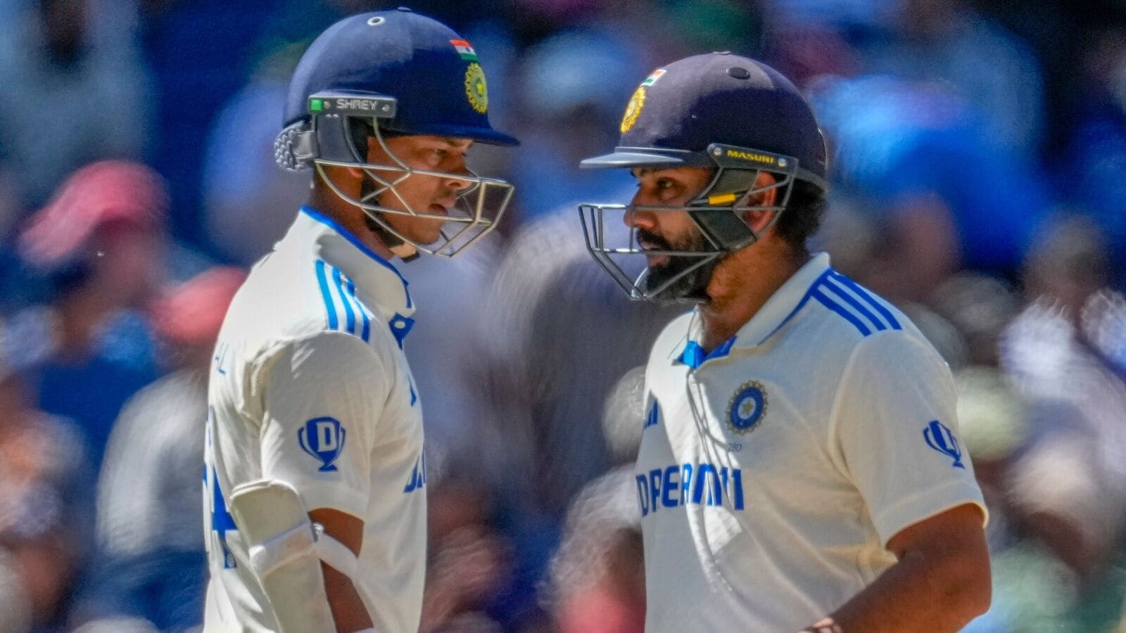 India's captain Rohit Sharma (R) and Yashasvi Jaiswal during play on the last day of the fourth Test against Australia at MCG. 