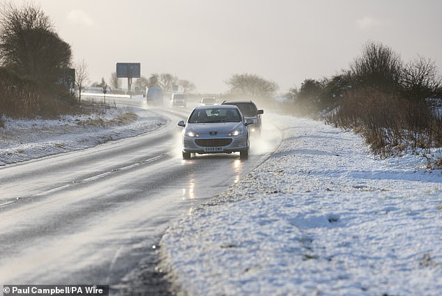 Vehicles driven on the A9 in Inverness today as snow, rain and wind warnings are in force