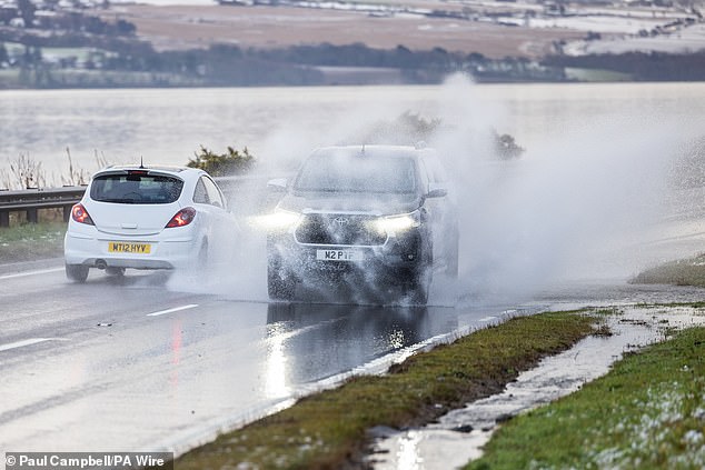 Vehicles driven on the A9 in Inverness today as snow, rain and wind warnings are in force