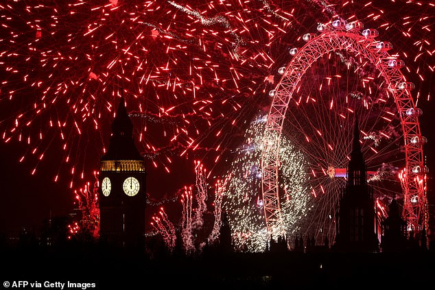 LONDON: Fireworks explode in the sky around the London Eye and The Elizabeth Tower, commonly known by the name of the clock's bell, "Big Ben", at the Palace of Westminster, home to the Houses of Parliament, in central London, at midnight