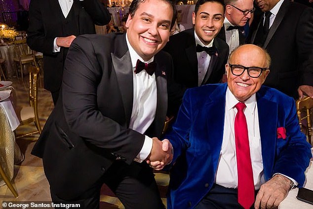 George Santos (left) was an attendee at Trump's 2020 Mar-a-Lago New Year's Eve party after losing his first Congressional run. He was later elected in 2022. Santos and his then-fiance posed for a shot with former New York City Mayor Rudy Giuliani