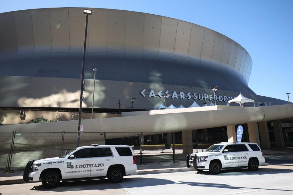 Police cars are outside the Caesars Superdome hours after 10 were killed in New Orleans after a terrorist attack (Getty Images)