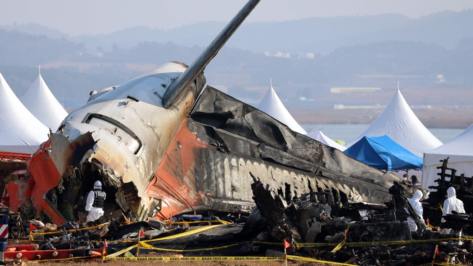 South Korea plane crash: Police raid Jeju Air office, Muan airport | World News