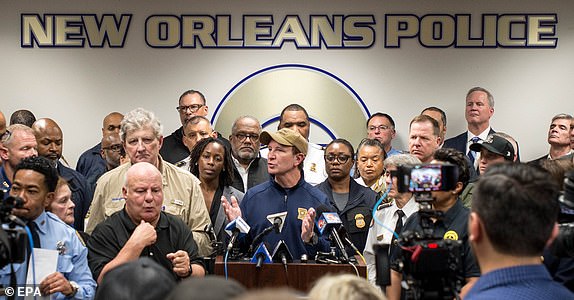 epa11801755 Louisiana Governor Jeff Landry (C) speaks to the media following a suspected terror attack in New Orleans, Louisiana, USA, 01 January 2025. At least 10 people are dead and 30 injured after a man drove a white pickup truck into a crowd on Bourbon Street. The driver was killed in a shootout with police. The FBI is investigating the incident as an act of terrorism.  EPA/SHAWN FINK