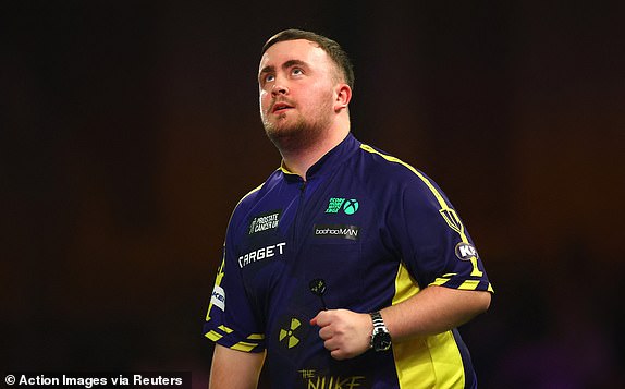 Darts - 2025 PDC World Darts Championship - Alexandra Palace, London, Britain - January 1, 2025 Luke Littler reacts during his quarter final match against Nathan Aspinall Action Images via Reuters/Andrew Boyers