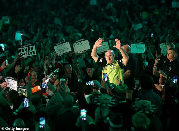 LONDON, ENGLAND - JANUARY 02: Michael van Gerwen of the Netherlands acknowledges the fans prior to his Semi-Final match against Chris Dobey of England  during day fifteen of the 2024/25 Paddy Power World Darts Championship at Alexandra Palace on January 02, 2025 in London, England. (Photo by James Fearn/Getty Images)