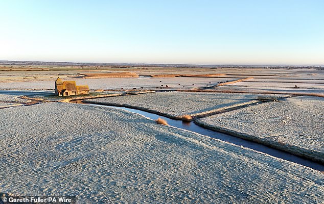 St Thomas Becket church is surrounded by frosty fields on Romney Marsh in Kentyesterday