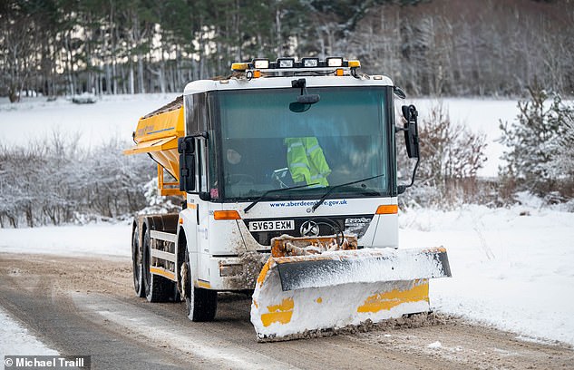 A snow plough clears the roads around Alford in Aberdeenshire on Friday amid severe weather