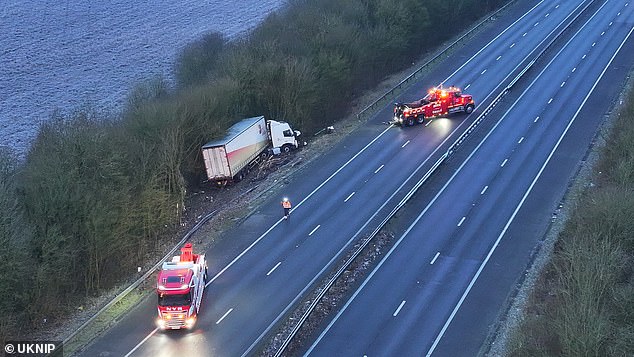 A major crash involving a heavy goods vehicle (HGV) has caused severe disruption on the M26 this morning