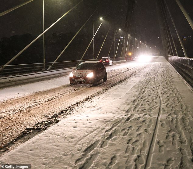 An image of a snow covered road at the Chartist Bridge