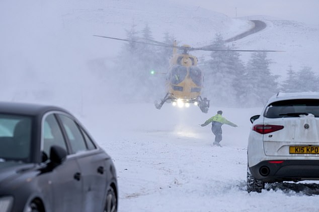 Air ambulance taking an injured skier off to the hospital in Scotland