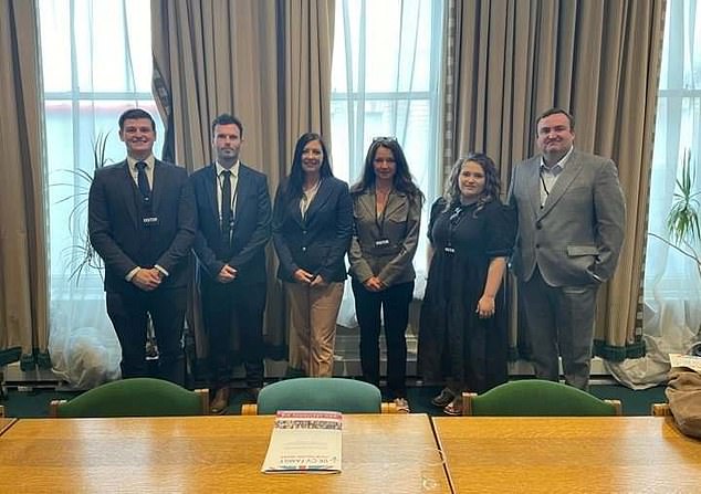 Charlet Crichton (third from left), who founded the charity UKCVFamily for those affected by Covid vaccines, is pictured with fellow campaigners during a visit to talk to MPs in Westminster