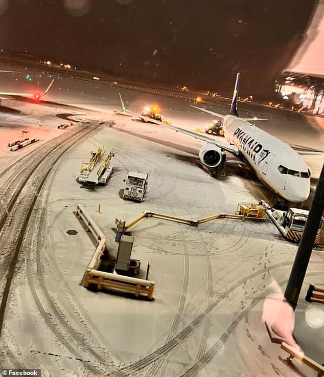 Heavy snow has caused disruption and runways to close at Manchester Airport this morning