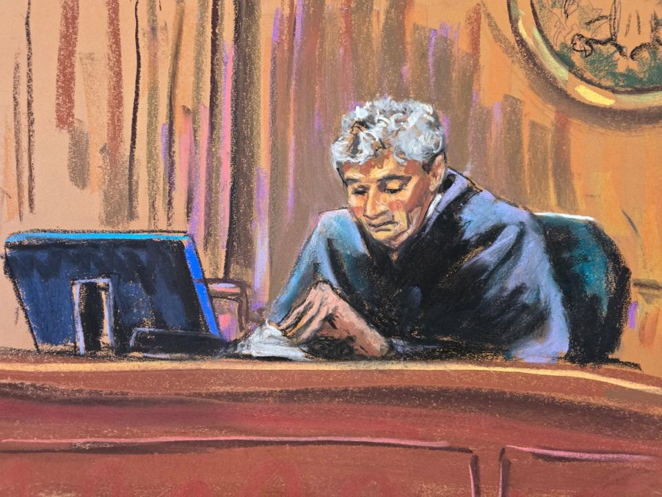 A court sketch depicts District Judge Lewis Liman reading an order finding Rudy Giuliani in contempt of court with additional sanctions in his property turnoever case (REUTERS / Jane Rosenberg)