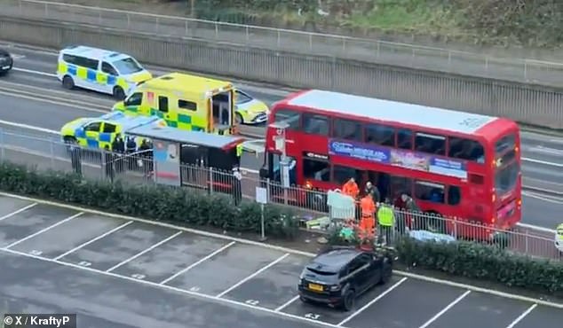 An image from the scene after a 14-year-old was stabbed to death on a bus in Woolwich