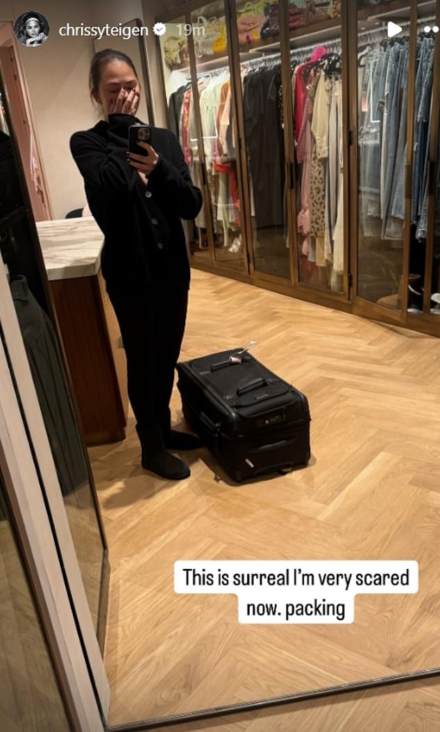 'This is surreal,' she captioned a mirror selfie from her closet as she held her hand in front of her mouth. 'I'm very scared now. Packing'