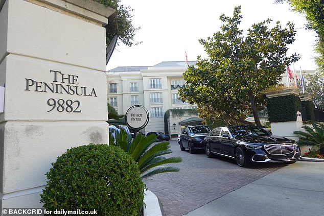 The parking lot at the famous Peninsula hotel in Beverly Hills is gridlocked with scores of high-end motors