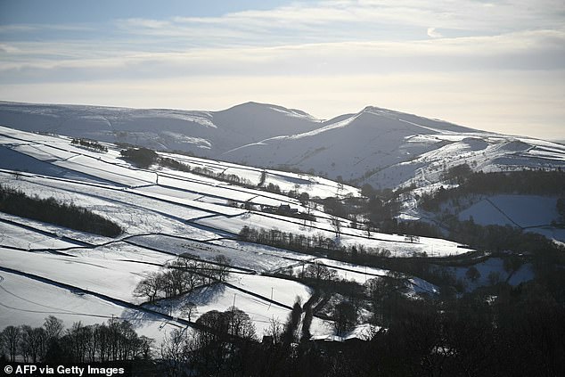 PEAK DISTRICT: Snow lies on the ground on the lower slopes of Kinder Scout, in the Peak District National Park on Friday