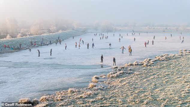 People out on the Cambridgeshire Fens this morning skating at Upware near Ely as the temperatures stayed below zero