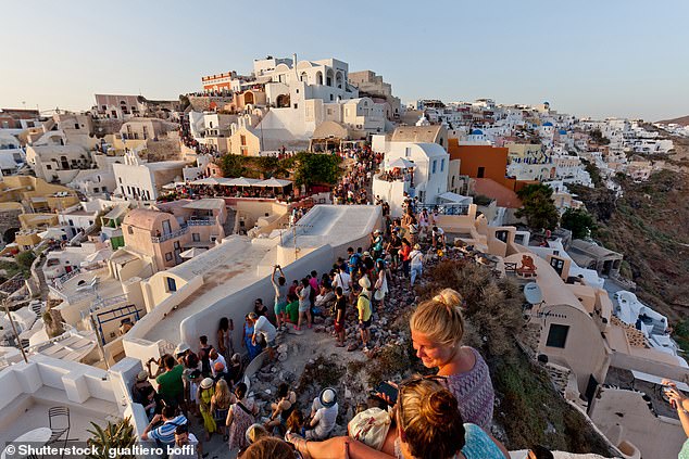 Britons will invest their money in places such as Greece instead of Spain amid plans for an ‘extreme’ hike in property taxes Pictured: Santorini, Greece.