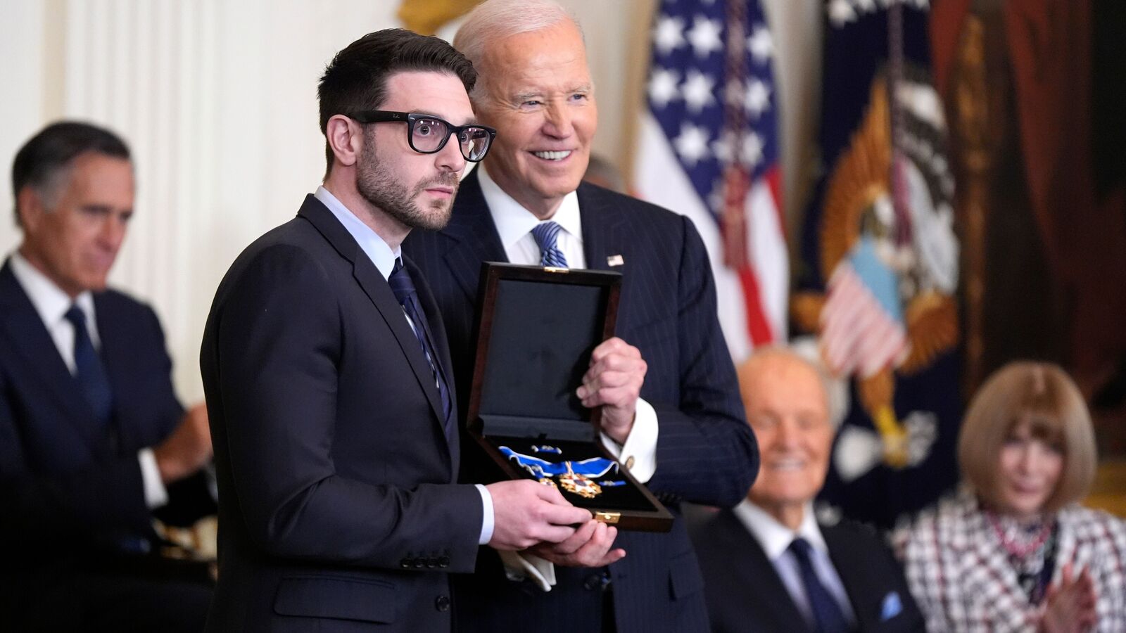 President Joe Biden, right, presents the Presidential Medal of Freedom, the Nation's highest civilian honor, to Alex Soros on behalf of his father George Soros, in the East Room of the White House, Saturday, Jan. 4, 2025, in Washington. (AP Photo/Manuel Balce Ceneta)