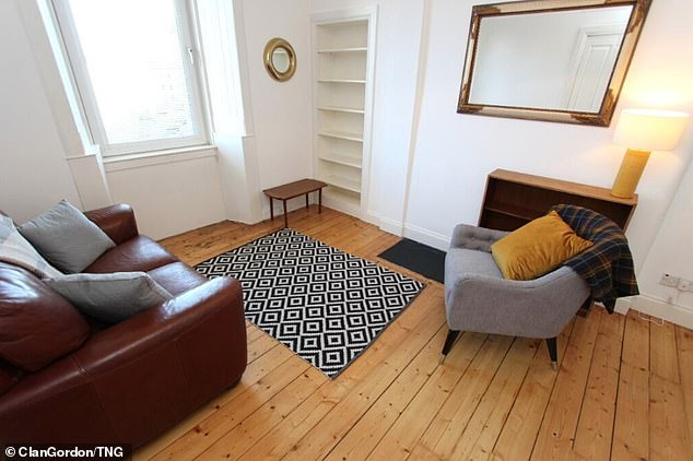 The flat, in Edinburgh , Scotland, has a spacious living room, bedroom and kitchen - but the toilet facilities are rather on the cramped side