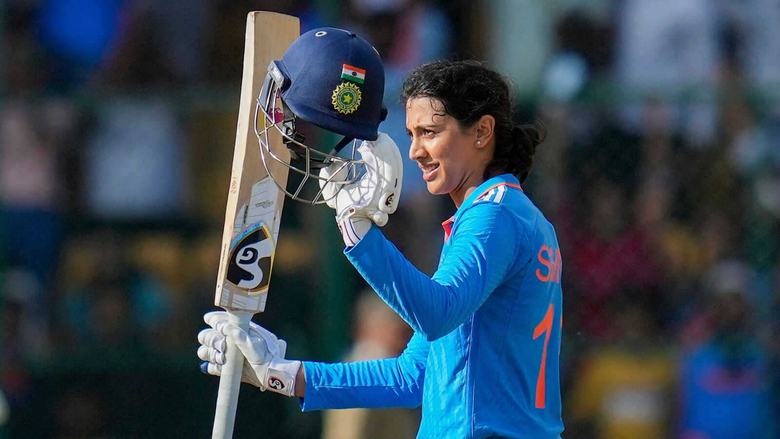 Indian batter Smriti Mandhana celebrates her century during the first women's ODI cricket match between India and South Africa at M Chinnaswamy Stadium, in Bengaluru, Sunday, June 16, 2024. (PTI Photo/Shailendra Bhojak)