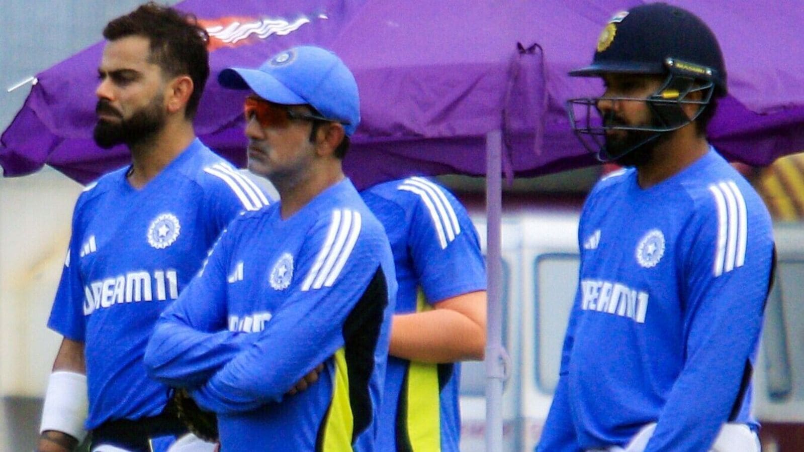 Indian cricket team head coach Gautam Gambhir (C) with captain Rohit Sharma (R) and Virat Kohli.