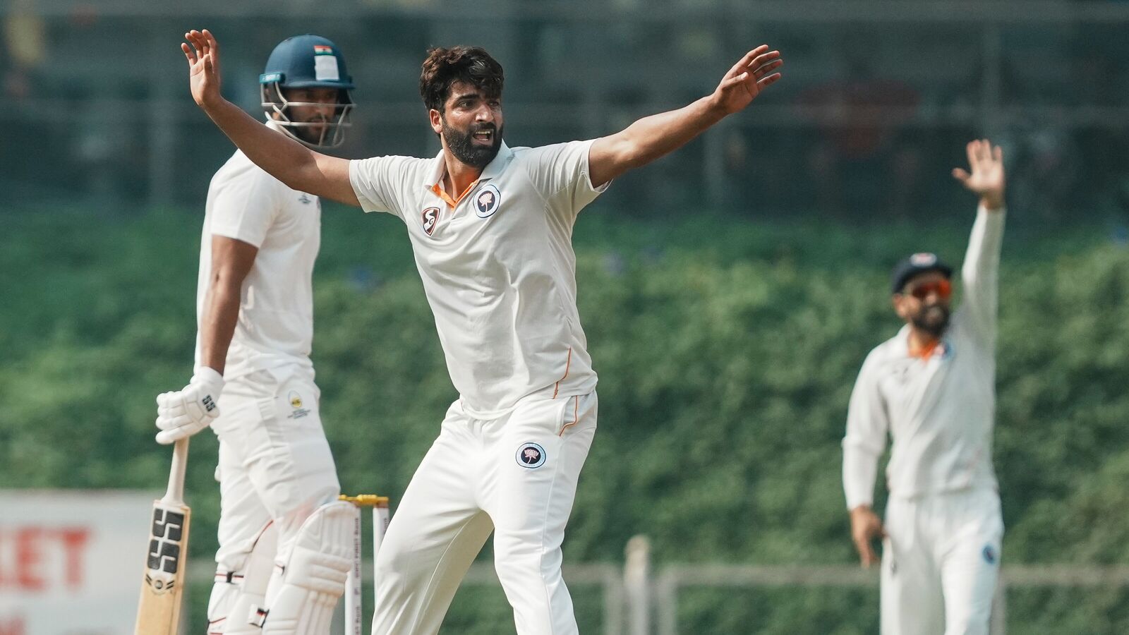 Jammu and Kashmir's Umar Nazir Mir celebrates the wicket of Mumbai's Shivam Dube during their Ranji Trophy 2024-25 match.