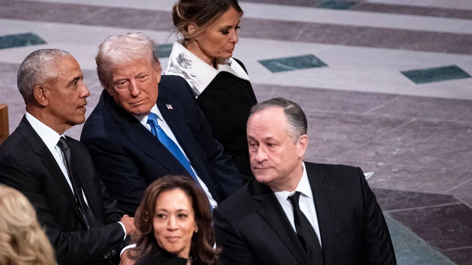 Former US President Barack Obama, from back left, President-elect Donald Trump, former First Lady Melania Trump, and Vice President Kamala Harris, front left, and Second Gentleman Doug Emhoff during the funeral service of late former US President Jimmy Carter at the Washington National Cathedral in Washington, DC, US, on Thursday, Jan. 9, 2025.  Photographer: Al Drago/Bloomberg