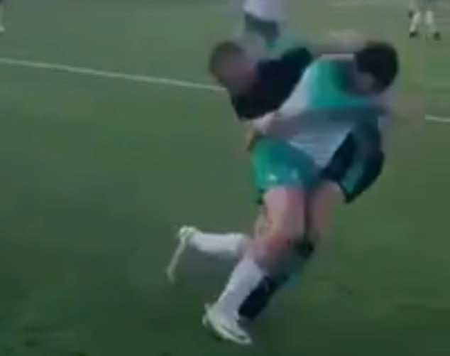 Conor McGregor wrestled his opponent to the ground in an amateur football game on Saturday