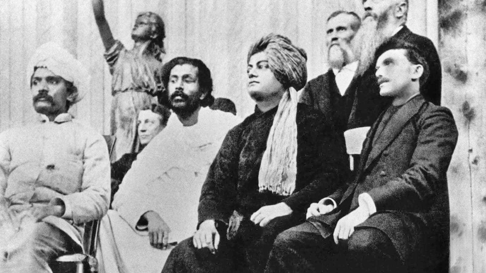 Swami Vivekananda at Parliament of Religions. From left to right: Virchand Gandhi, Hewivitarne Dharmapala, Swami Vivekananda, (possibly) G. Bonet Maury.