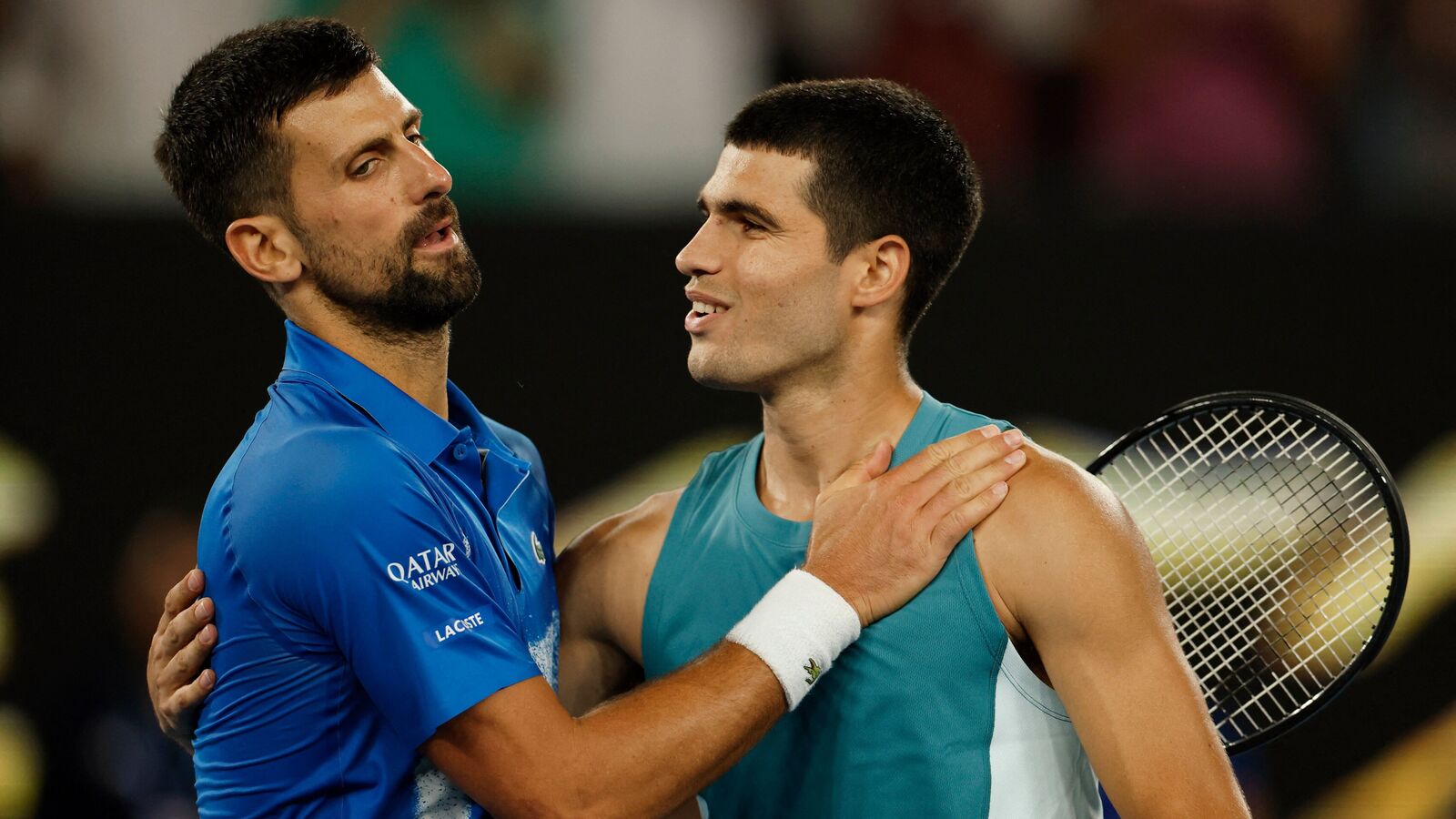 Carlos Alcaraz congratulates Novak Djokovic after the latter won the Australian Open 2025 quarterfinal. 