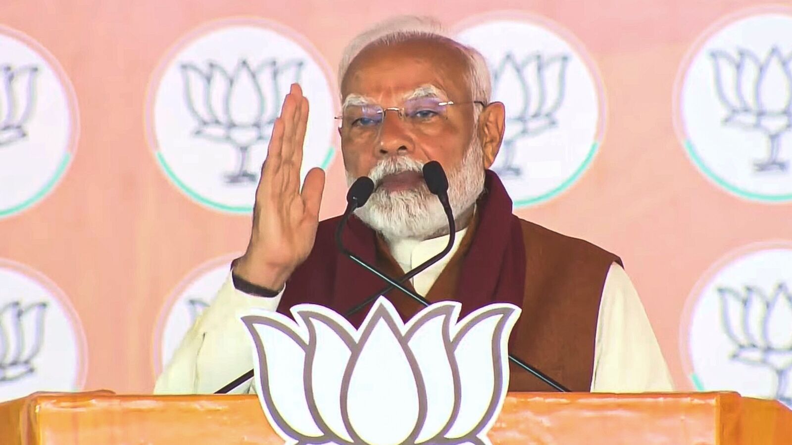 Prime Minister Narendra Modi speaks during a public meeting for Delhi Assembly elections, at Dwarka, in New Delhi.