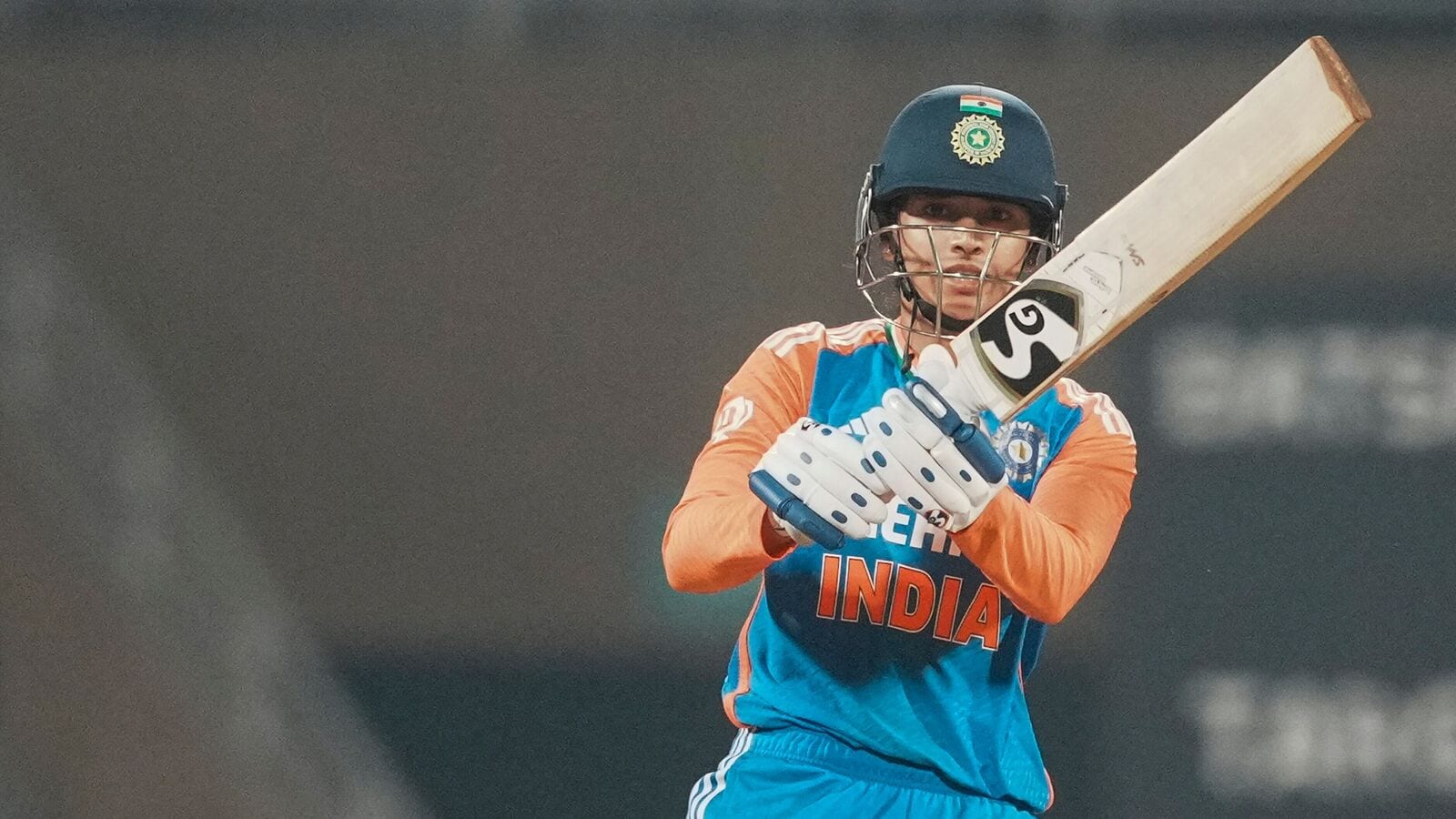 India Women's Smriti Mandhana plays a shot during the third T20 International cricket match