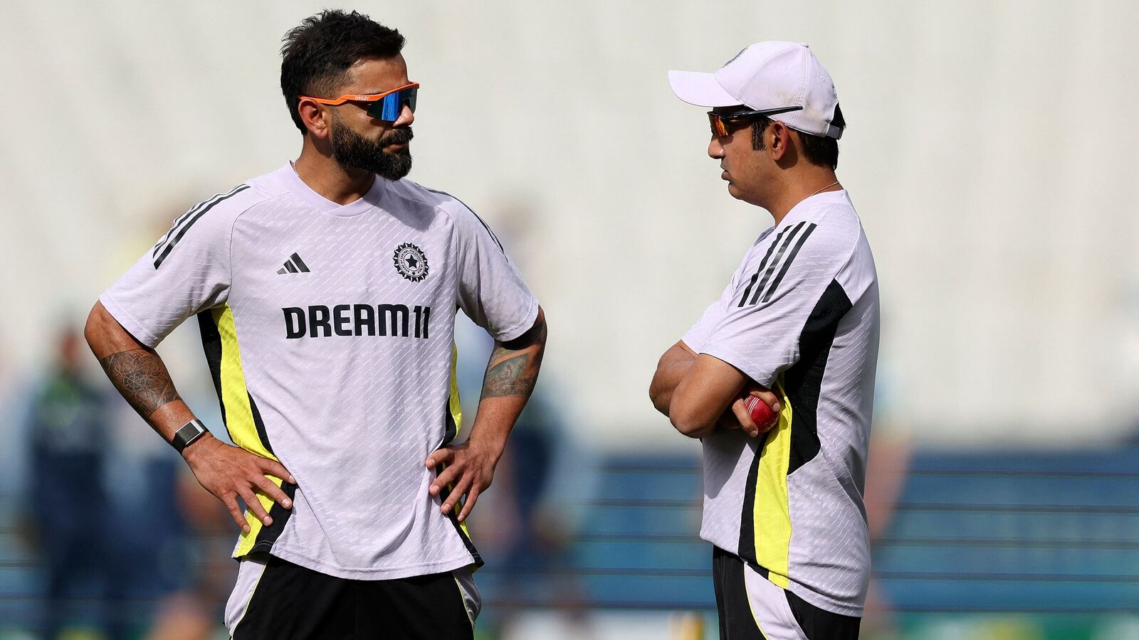 Virat Kohli (L) chats with India head coach Gautam Gambhir during one of the training sessions in Australia. 