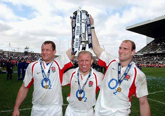 England's back row of Richard Hill, Neil Back and Dallaglio celebrate England completing the grand slam after beating Ireland 42-6 in Dublin