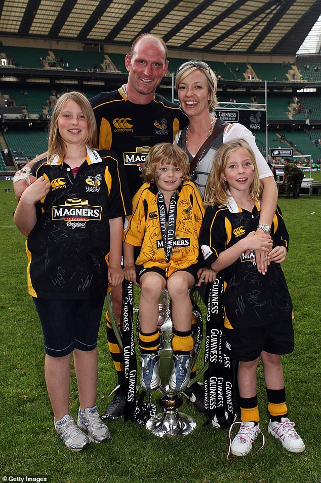 Dallaglio celebrates with Alice, son Enzo and daughters Ella (left) and Josie after Wasps win the Guinness Premiership Final match in 200