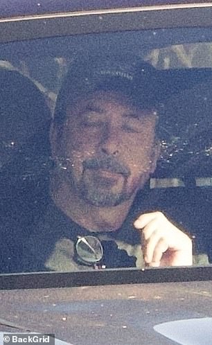 Grohl was photographed in the passenger's seat of Blum's black BMW on Sunday, February 9, as she drove them around Los Angeles