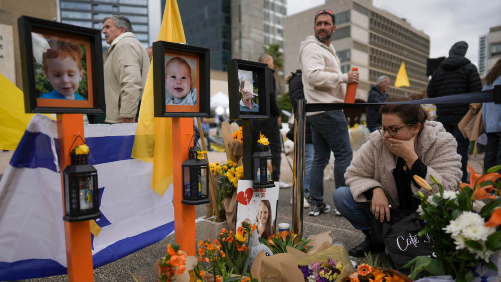 Israel mourns death of two youngest Hamas hostages; people wear orange bands | World News