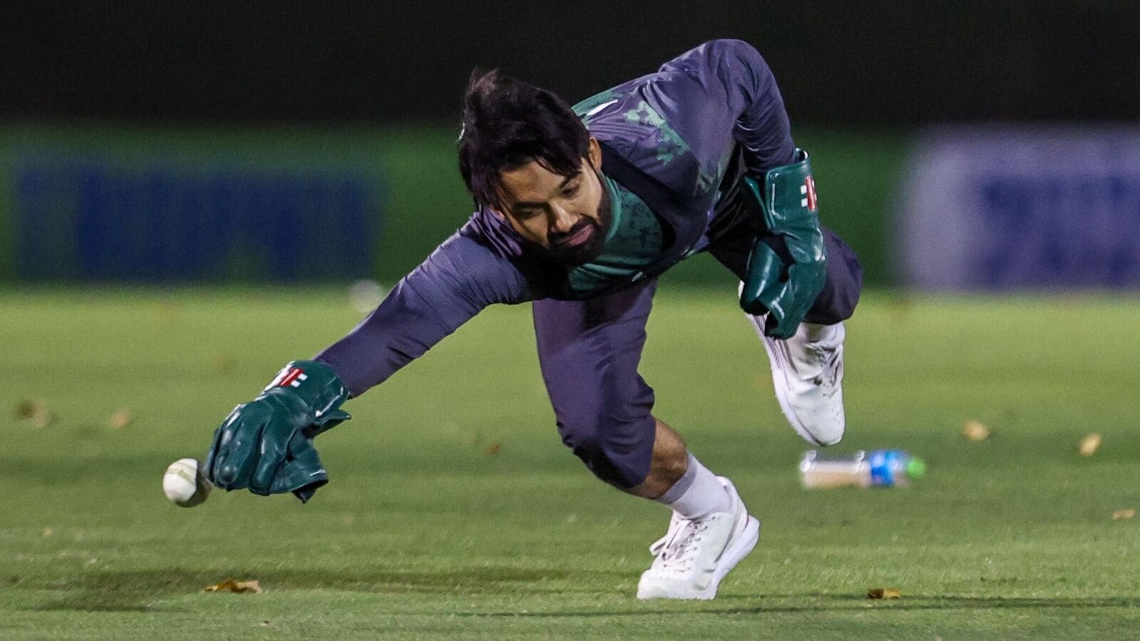 Pakistan's captain Mohammad Rizwan fails to grab the ball during a practice session ahead of India clash. 