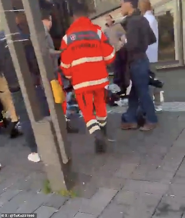 Footage shows dozens of people fleeing a major incident in Mannheim, Germany today