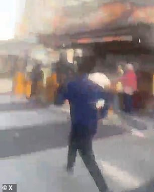 Footage captured shoppers making the mad dash down the street to flee the scene