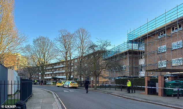 A cordon remains in place at the scene as police launch a murder investiagtion