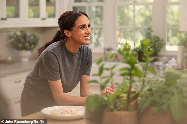 Meghan shows off her Hollywood smile during the filming of episode three