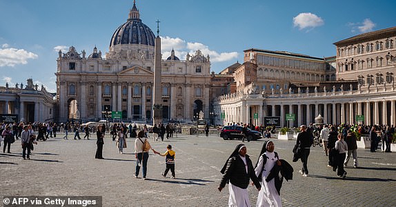 Nuns walk in St Peter's square in The Vatican on March 04, 2025. Pope Francis was breathing without a mask on March 4, 2025 after suffering two bouts of acute respiratory failure, the Vatican said as the leader of the world's Catholics spent his 19th day in hospital with pneumonia. (Photo by Dimitar DILKOFF / AFP) (Photo by DIMITAR DILKOFF/AFP via Getty Images)