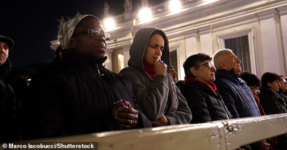 Mandatory Credit: Photo by Marco Iacobucci/Shutterstock (15177828an) A group of nuns on the eighth day, recite the holy rosary for Pope Francis in St. Peter's Basilica forecourt. Pope hospitalized at the Gemelli Polyclinic for pneumonia. Cardinal Robert Prevost leads the recitation of the Holy Rosary for Pope Francis, Vatican City, Italy - 03 Mar 2025